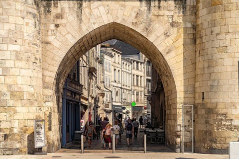 Entrance to the historic city centre through the Porte de la Grosse Horloge clock tower in La