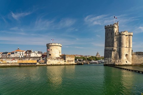 Harbour entrance to the old Vieux Port with the medieval towers Tour St.-Nicolas and Tour de la