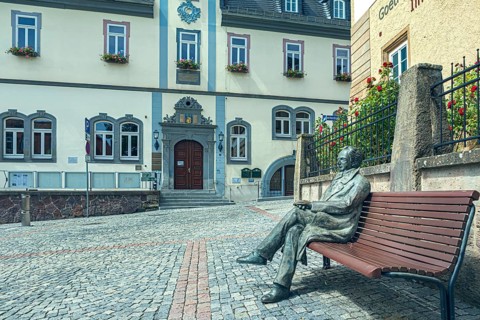 At the market with town hall and Göthe City Museum in Ilmenau, Thuringia, Germany
