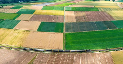 Agricultural area in the Neckarbogen near Lauffen am Neckar. Regional railway on the way. Lauffen