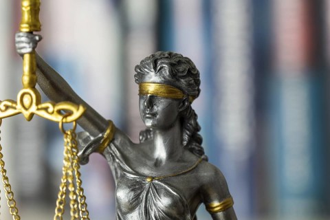 Close-up of a Justitia as a symbol of court judgements, jurisdiction, justice, etc
