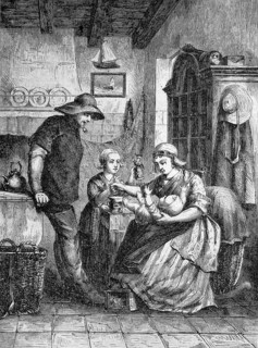 A fishing family with two children in their kitchen in Scheveningen in Holland, Historical,