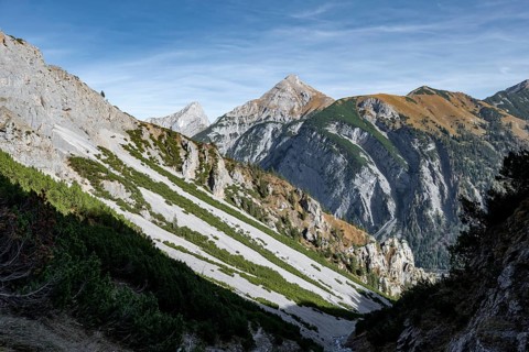Narrow mountain valley, view of autumnal mountain landscape with mountain peaks Sonnjoch and