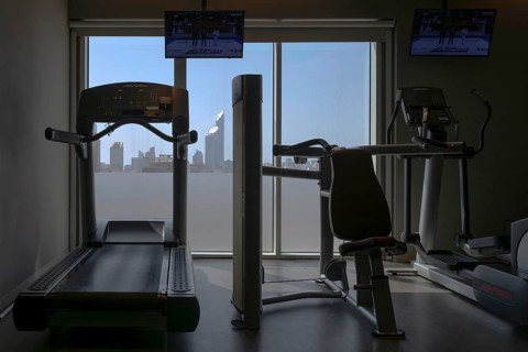 Fitness centre with city view, Abu Dhabi, United Arab Emirates