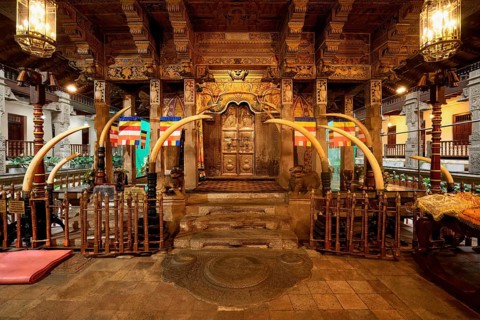 Temple of the sacred Tooth Relic or Sri Dalada Maligawa, Holy Shrine decorated with elephant tusks,