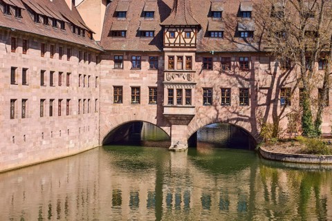 Heilig-Geist-Spital, historical hospital, river Pegnitz, tree, reflection, water surface,