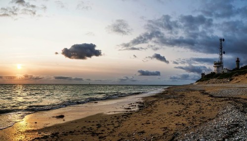 Panorama of Sunset over beach of WHALE LIGHTHOUSE, Saint-Clement-des-Baleines, Atlantic, France