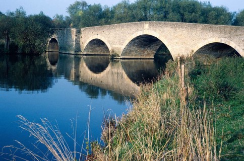 Historic arched stone bridge built 1807, River Thames, Sutton Bridge, Culham, Oxfordshire, England,