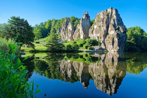 The Externsteine, a sandstone rock formation around 40 metres high in the Teutoburg Forest, are a