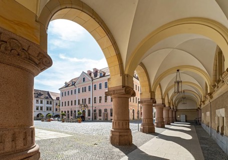 View of Hotel Börse through the arches of the New Town Hall of Görlitz, Lower Market Square -
