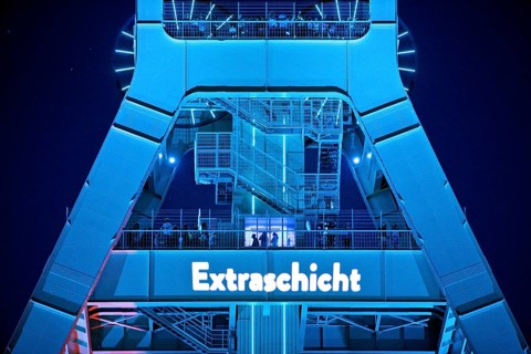 Illuminated headframe of the German Mining Museum with people, Extraschicht, Bochum, Ruhr area,
