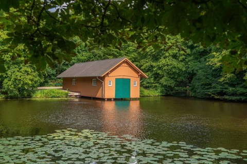 Boathouse at Meiereisee in Bürgerpark from 1866, landscape park with rivers and lakes, garden