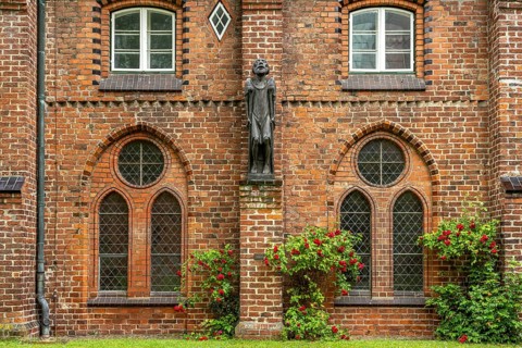 Sculpture The Beggar by Ernst Barlach in the inner courtyard of the cloister of Ratzeburg
