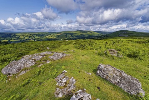 Stones and landscape at the top Tor tor rock hill in Dartmoor National Park. Widecombe-in-the-Moor,