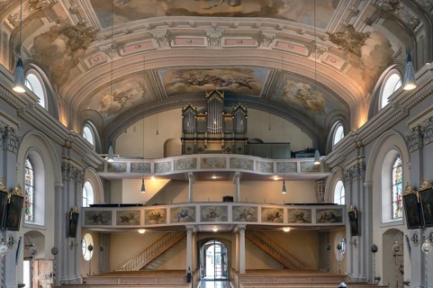 Interior with organ loft of the baroque parish church of St Nicholas, 1725, Tannheim, Austria