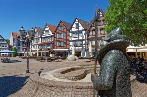 The statue of the night watchman on the market square in the historic old town of Rinteln. Lower