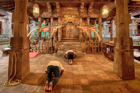 Pilgrims praying in front of the Holy Shrine, Temple of the sacred Tooth Relic or Sri Dalada