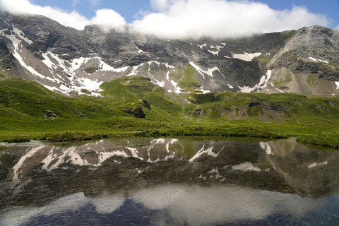 Lake in the Cirque de Troumouse basin in the Pyrenees National Park near Gavarnie-Gèdre, France