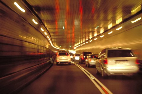 Evening rush hour in the Lincoln Tunnel, blurred, New York City, USA