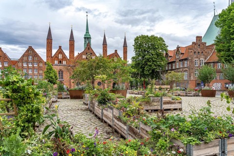 Flower boxes at Geibelplatz and Heiligen-Geist-Hospital in the Hanseatic city of Lübeck,