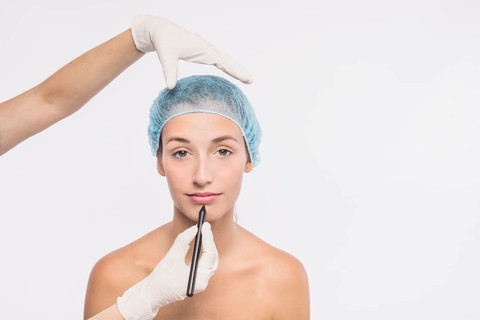 Pretty woman preparing injection by doctor