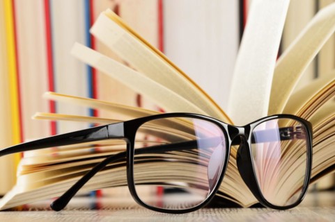 Composition with glasses and books on the table