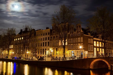 Full moon over the Herengracht in Amsterdam, Netherlands in springtime