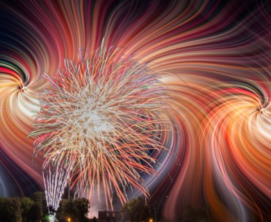Colorfull fireworks display on the night sky with twirl effect