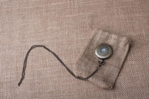 Mechanical pocket watch on a sack