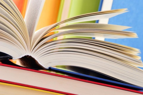 Composition with hardcover books in the library
