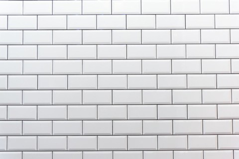 Background from a white tile wall