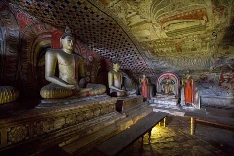 Dambulla, Sri Lanka, August 15, 2018: Buddha statues inside the historical Dambulla Cave Temple