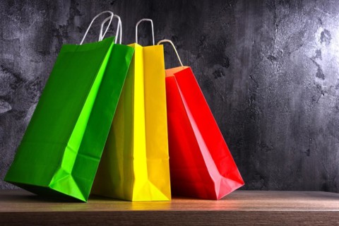 Composition with colorful paper shopping bags