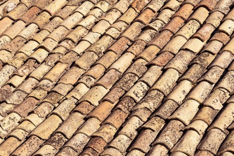 Old tiles on a roof in Sicily, Italy