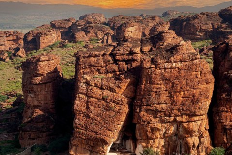 Rust red sandstone Rocks in Badami, Karnataka, South India, India, Asia