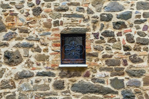 Cloudy autumn day in Tuscany. The small town of Montalcino. The beautiful decor element of a small