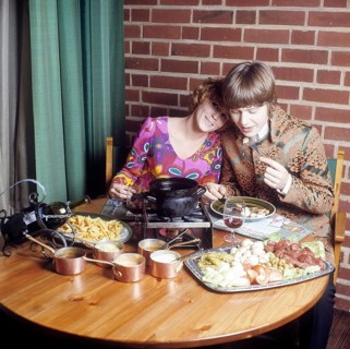 Fondue. A dish that had its breakthrough in the 60s and 70s. A fondue pot with hot oil stands in