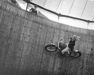Wall of death 1967. The wall of death, motordrome, velodrome or well of death is a carnival