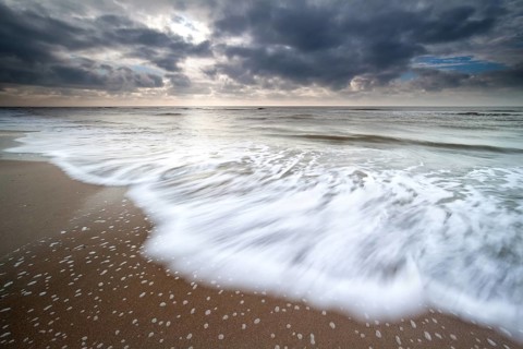 North sea waves on sand beach, Zandvoort, Netherlands