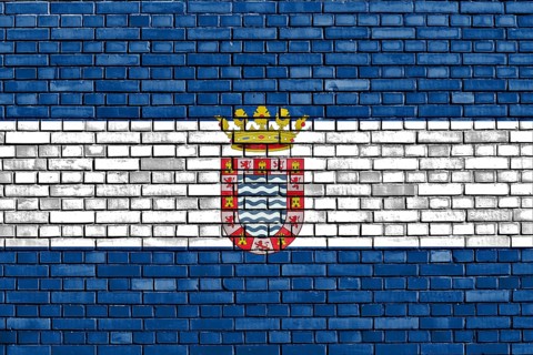 Flag of Jerez painted on brick wall