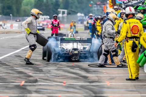 INDYCAR Series driver, RINUS VEEKAY (21) of Hoofddorp, Netherlands, brings his car in for service