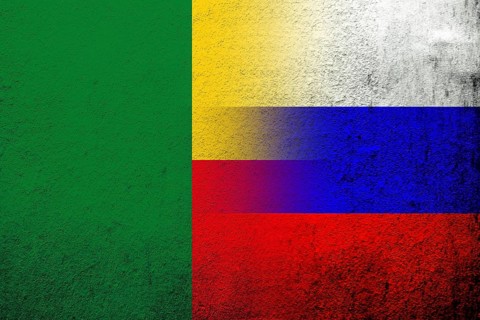 National flag of Russian Federation with Republic of Benin National flag. Grunge background