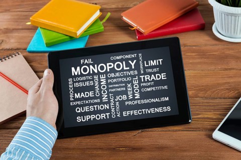 Close-up, male hands with tablet. Businessman working at the table in office