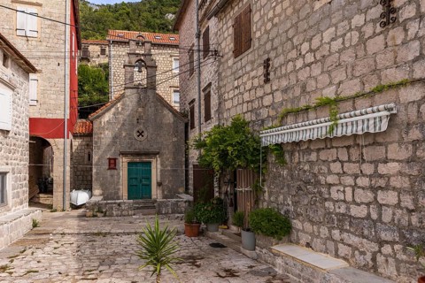 Perast, Montenegro, September 21, 2023: View of the historic town at famous Bay of Kotor with old
