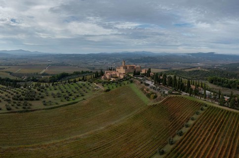 Montalcino, Italy, 16 November, 2023: aerial view of the Poggio alle Mura Castle and Villa Banfi