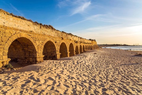 The aqueduct, built in the early Byzantine period. Fantastic sunset on the Mediterranean coast in