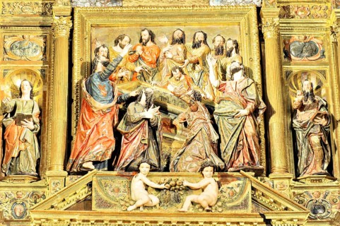 Detail of a baroque relief with religious figures and golden decorations, Iglesia de Santa Maria de