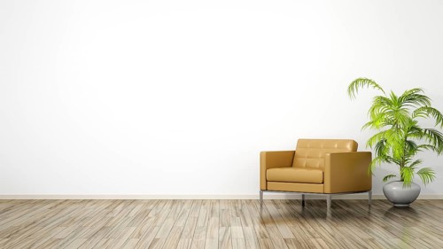 A room with an armchair and space for your content