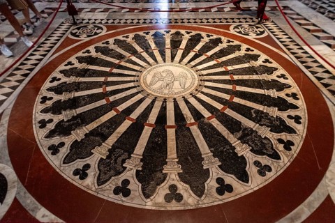 SIENA, ITALY, SEPTEMBER 23, 2023, Unique marble inlays on the floor of the Siena cathedral in Italy