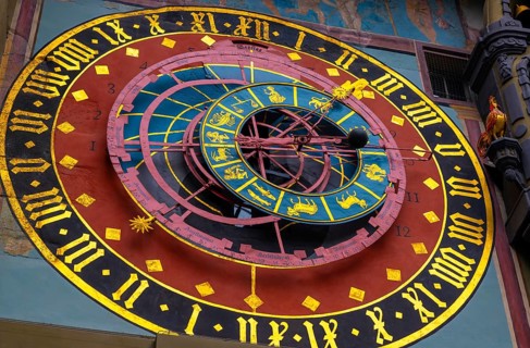 The Astronomical Clocks on The Clock Tower (Zytgloggethe) on the Main Street in Old Town in City of